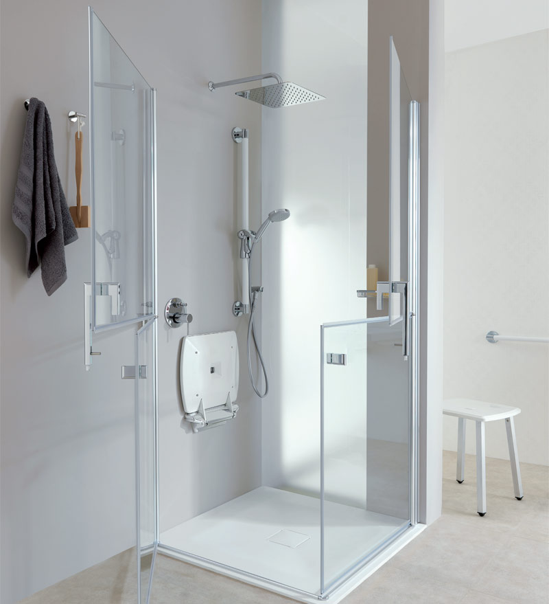 Shower with wall mounted seat, grab bar and shower unit with double doors