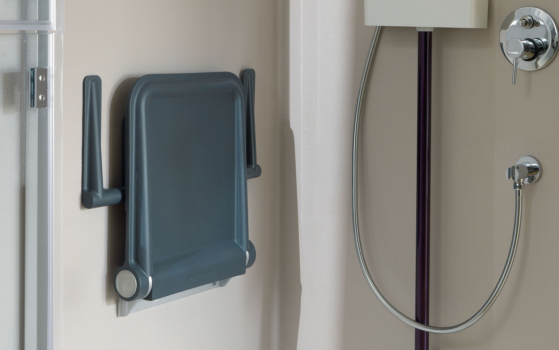 Shower seat in closed position